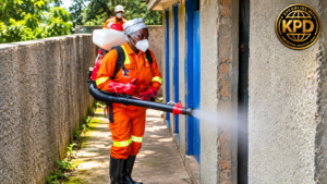 Zoomlion Sanitation Worker Spraying Concrete Corridor